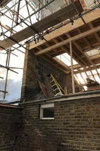 Raised party wall