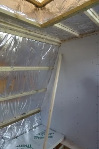 Continuous Superquilt insualtion under joists