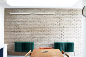 Exposed brickwork to side-infill extension