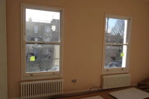 New double glazed sash windows & column radiators