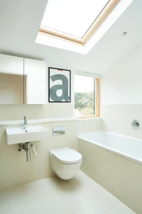 Family bathroom with vaulted ceiling