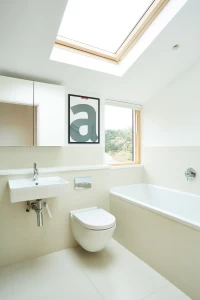Family bathroom with vaulted ceiling