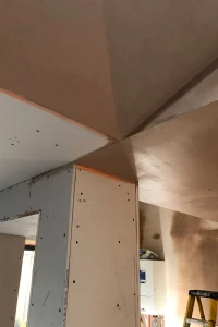 Plastered steel junction