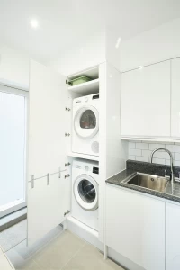 Stacked laundry appliances