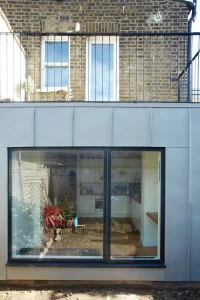 Zinc clad rear extension & balcony