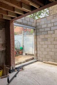 Side-infill extension patio door opening