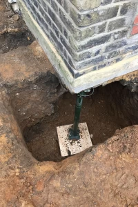 Mass pad underpin excavation