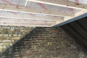 Raised party wall
